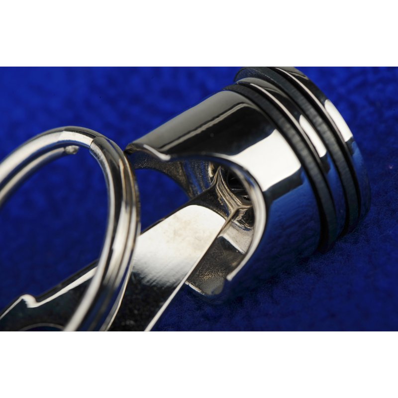 R73225 - Brelok metalowy Piston, srebrny 